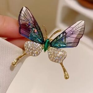 Elegant Butterfly Brooch with Gold and Green Accents